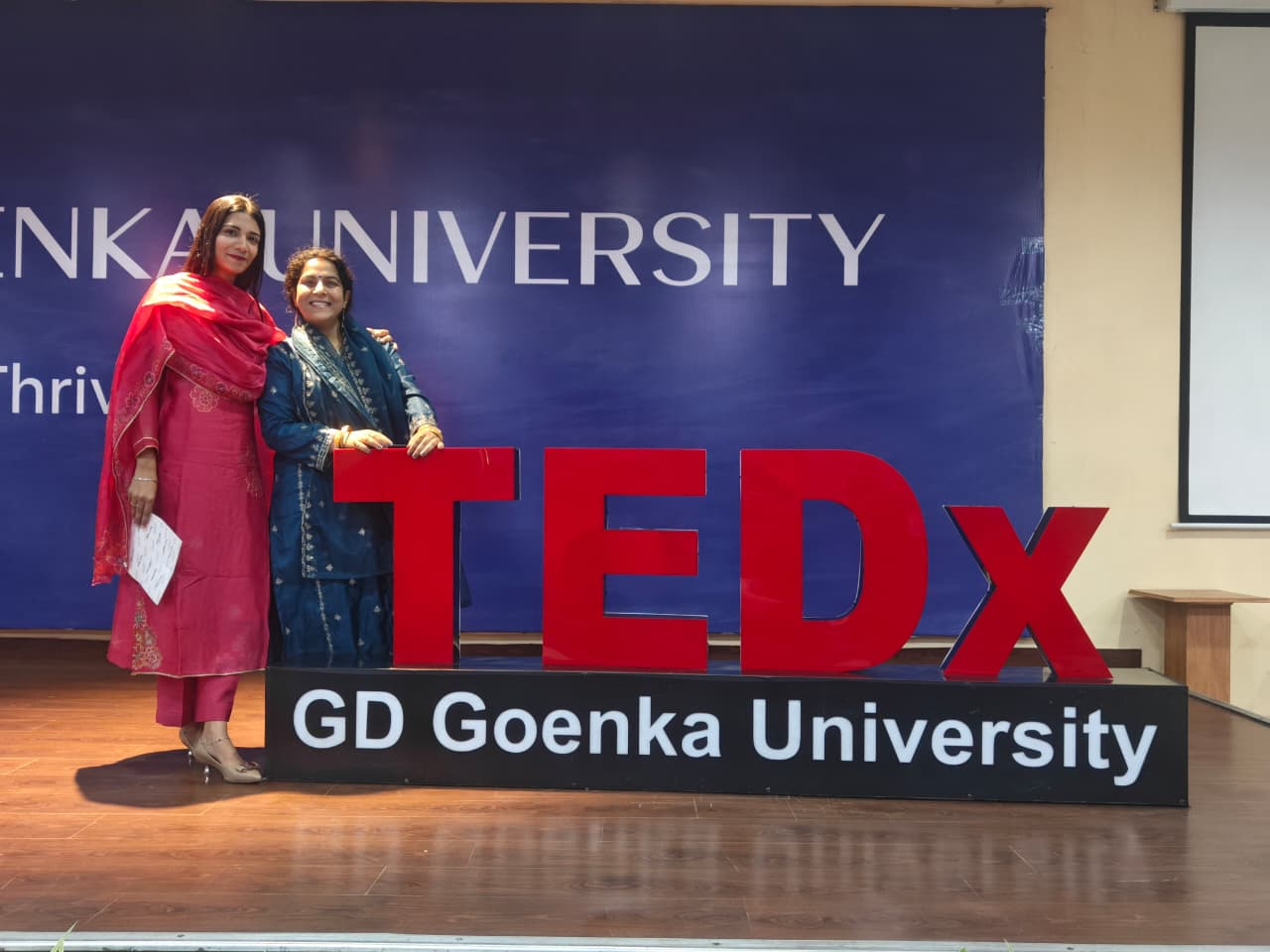 On stage at TEDx GD Goenka University.